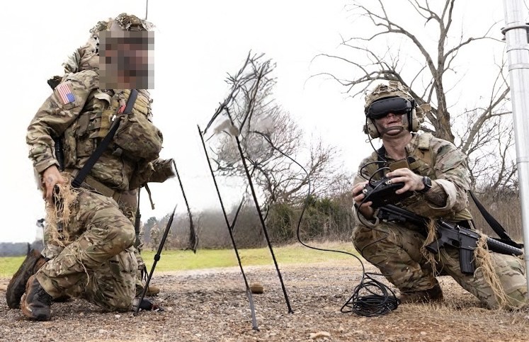 Two AMNESTY operators running an FPV system in the field