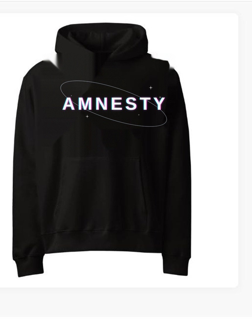 The AMNESTY UXS hoodie in black — the chrome AMNESTY wordmark in a tilted orbit ring on the chest, with cyan and magenta chromatic glow